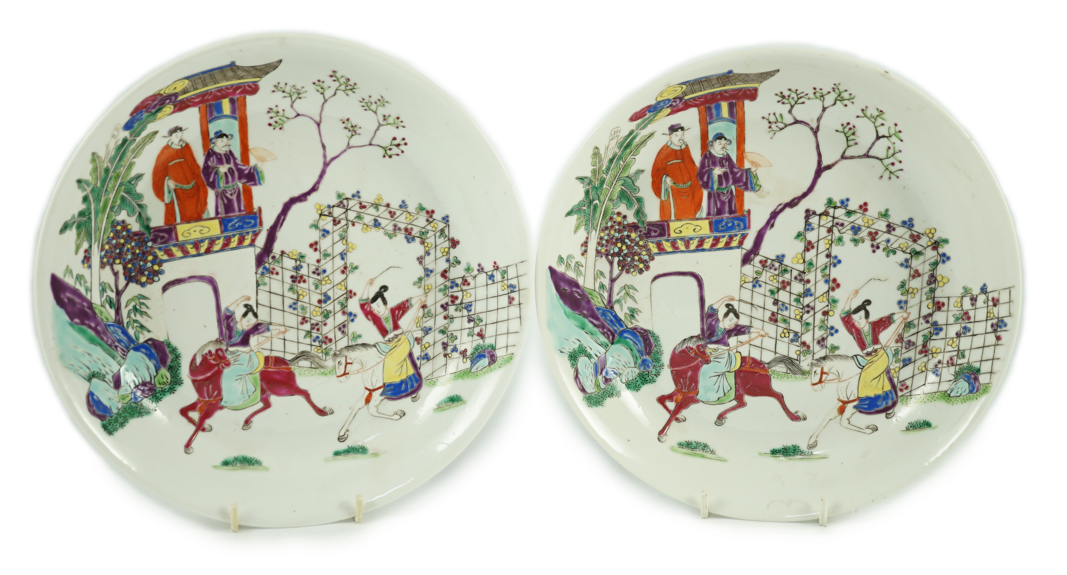 Two Chinese famille rose fencai saucer dishes, Yongzheng marks but 19th century, 23.7cm diameter